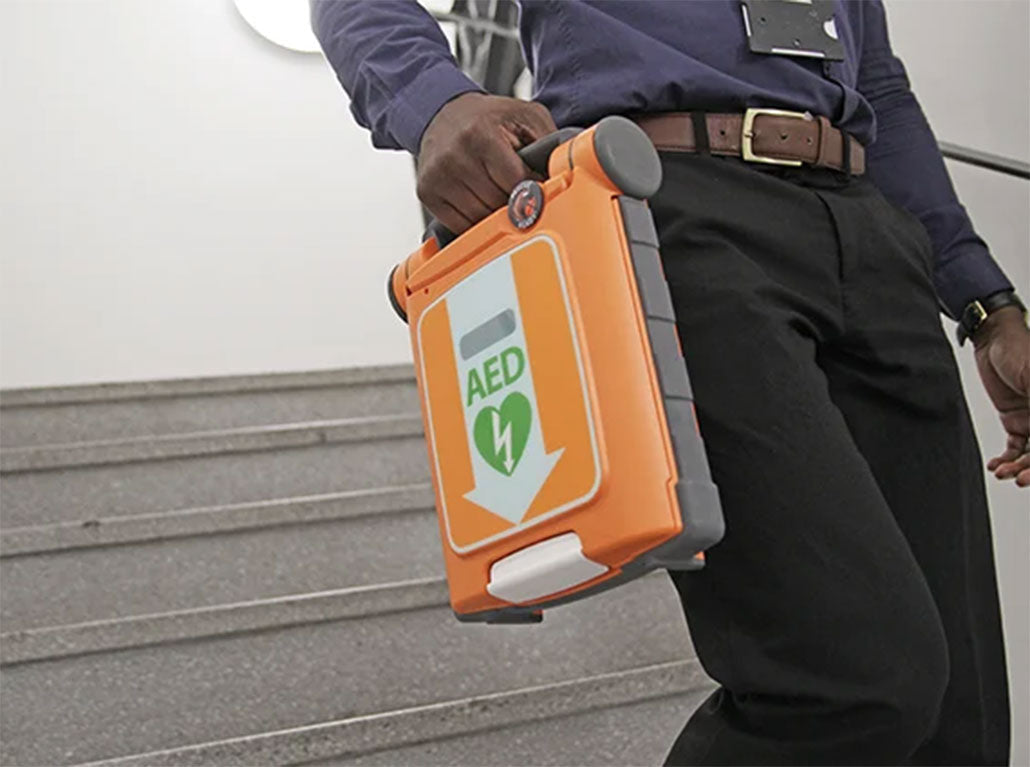 Brave staff: First aid training and a defibrillator save a life