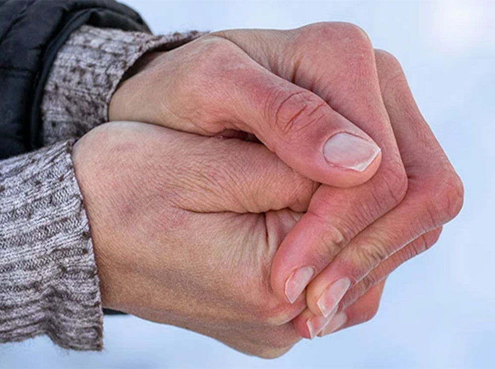 hands depicting the cold weather