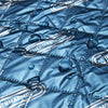 A close-up of the THERMARMOUR Baby Wrap, with water droplets on it.