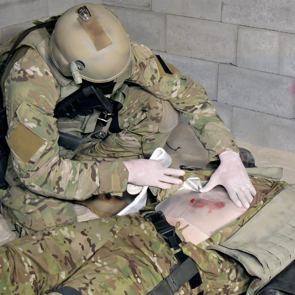 A demonstration of the TacMed BLAST Bandage applied to a wound.