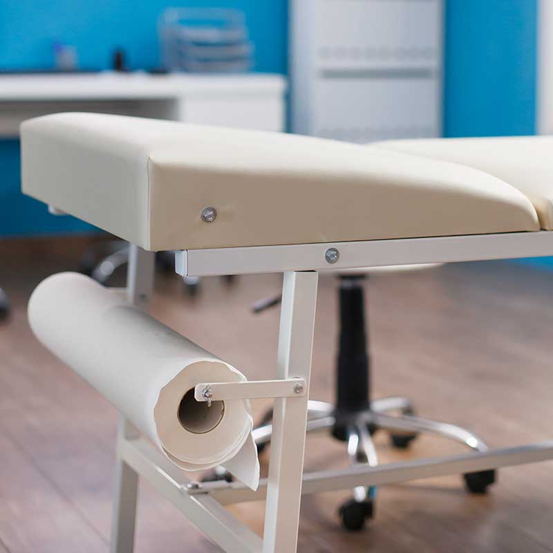 Medical bed in workplace first aid rooms