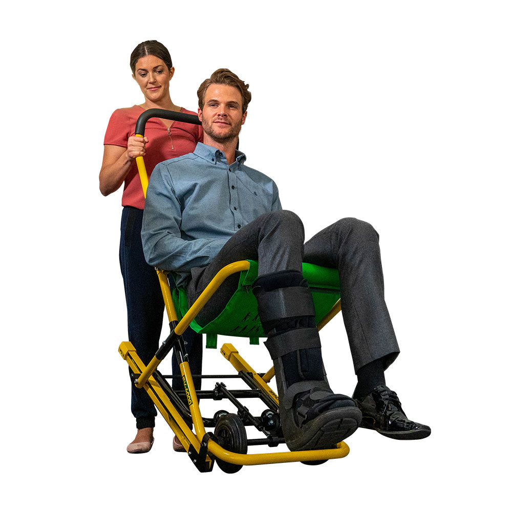 A pair of learners using an evacuation chair.