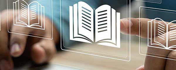 Hand interacting with digital book icons on a blurred background